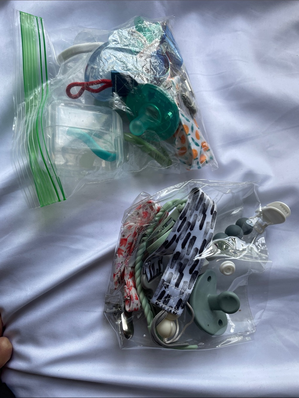 New Pacifiers and clips with case
